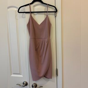 Pale pink short dress.